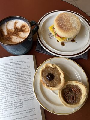 Chai latte, breakfast sandwich 🥪 & chocolate🍫/pecan tarts 🥧! ALL DELICIOUS!!  at Earth's Refillery Coop in Edmonton