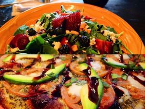 California Caprese Pizza with a Strawberry Fields salad! at ZaZaZa in Ottawa