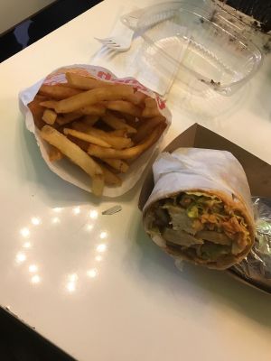 Spicy buffalo chicken wrap and fries  at VLife in New York City