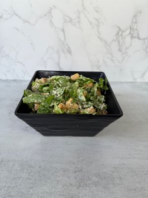 Ceasar Salad with Chick’n - Crisp romaine lettuce, toasted croutons and grated vegan Parmesan cheese. Served with plant based Caesar dressing on the side.
 at Aisha's Plant-Based Eatery in Miami