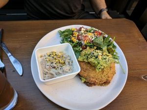 very dry zucchini fritters with avocado at Mondays in Auckland