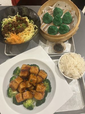 Impossible soup dumplings, general tso’s tofu, impossible Dan Dan noodles  at Wu and Nussbaum in New York City