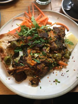 Vegan omelette with olives, mushrooms and cheeze   at Kin Cafe Vegetarian in London