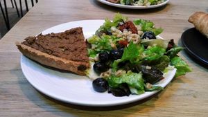 vegan Quiche with salad at Kin Cafe Vegetarian in London