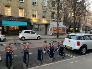 Bicycle scheme parking right outside at Kin Cafe Vegetarian in London