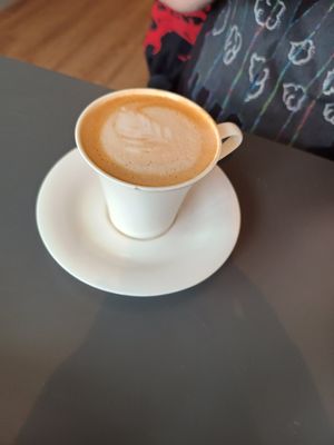 Oat latte at Whiskers & Cream Cat Cafe London in London