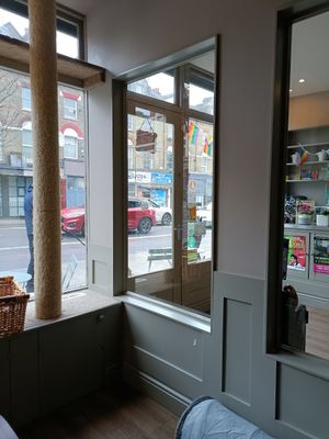 Inside entrance at Whiskers & Cream Cat Cafe London in London