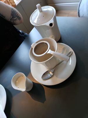 Oat milk tea at Whiskers & Cream Cat Cafe London in London