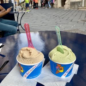 A scoop of hazelnut and pistachio, they have more soy based flavours. Yum. One scoop was 3 €. at La Gelateria in Taormina