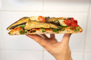 Vegan Eggplant
Roasted eggplant, zucchini, grilled capsicum, tomato sauce

 at Ta Ta Ta Pizza in Bondi Junction