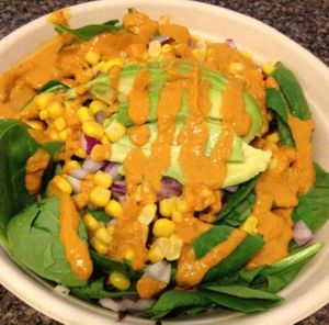 Fiesta Bowl: brown rice, black beans, corn, onions, avocado, sub'd spinach for tomatoes, red basil dressing at RAW Organic Food and Juice in Scottsdale