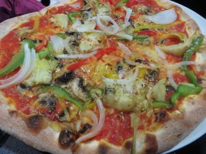 Pizza Vegetaria (green chillies ('Peperoni' is the German for 'chillies'), mushrooms, onions, peppers, with vegan cheese instead of mozzarella - please note that vegan cheese is only possible for groups upon advance notice!) at Angelos Via Napoli in Saarbrucken