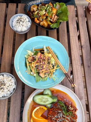 Vegan duck, green salad with mango & dumplings.  at Rau&La in Warsaw