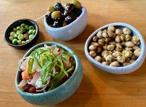 Larb Chickpea Crunch:
Kikkererwten met pittige Thaise kruiden € 6,5 -
Gochujang Olives: Olijven gemarineerd in Koreaanse chillipasta, look en sesam € 5,5 - Seasonal Kimchi:  at YUSU in Ghent
