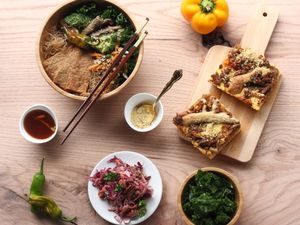 Clockwise from top: our Polenta Pizza, Apple Cabbage Slaw, and Vietnamese Noodle Bowl at Alternative Chef in Charlotte