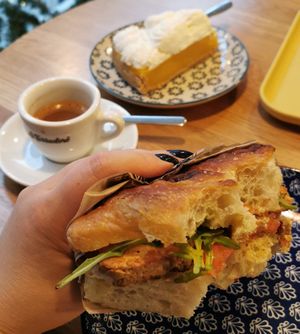 Foccaccia with tofu. Background cafe macchiato and lemon pie. at Cafè Karalis - Sardinialainen caffetteria in Pirkanmaa
