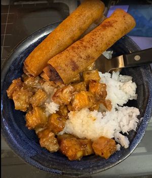 Tofu sisig, lumpia, half portion of "small" rice, garlic vinegar.   at Lasa Vegan Filipino Eats in Vancouver