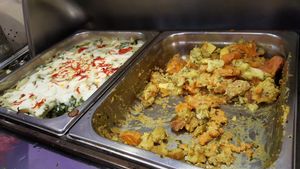 Pasta with spinachs, potatoes with carrots at Jardim dos Sentidos in Lisbon