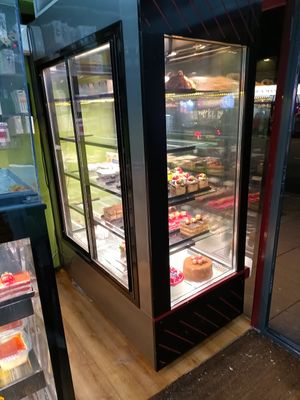 Cake display from inside at Bravo Patisserie in Brighton