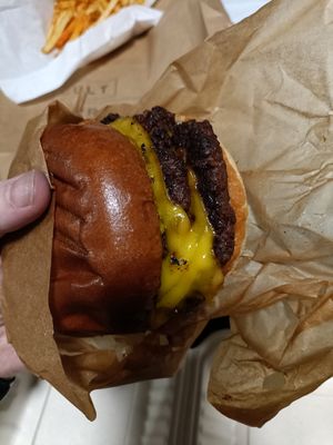 House triple cheeseburger side view at Cult Burger in East London