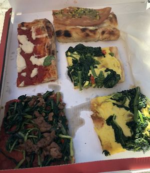 Da sinistra in alto: margherita, mortadella e pistacchio, broccoli e crema di tofu allo zafferano, rossa con salsiccia.   at Mo' Veggo in Rome