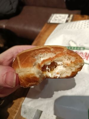 Salted caramel doughnut cross section at LTN - Krispy Kreme - Airside Departures in Luton