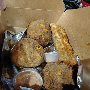 Vegan Philly cheese-steak in the egg roll form easy to eat.  Also vegan boudin balls.  A regional  delicacy, difficult to find in vegan form.  at Kale's Kytchen (Food Truck) in Houston