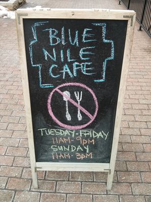 Outside sign from a few years ago...double check the hours! at Blue Nile Cafe in Kansas City