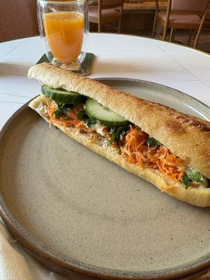 Banh mi and fresh pressed orange juice   at Le Goûter Parisien in Paris