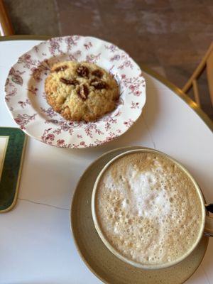 Cappuccino and pecan cookie   at Le Goûter Parisien in Paris