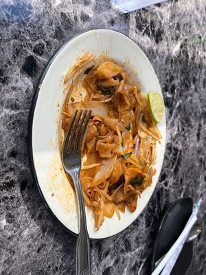 Partially eaten Pad Kee Mao  at My Thai Vegan Cafe in Boston