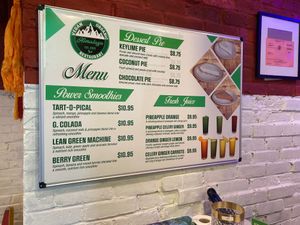 Wall menu for smoothies at Himalaya Vegan Organic Restaurant in New York City