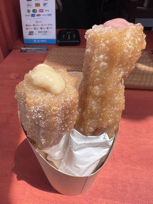 Sweet potato and Sakura fillings 😋   at Vegan Churros in Tokyo
