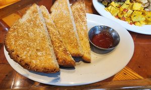 Whole wheat toast dry comes with vegan butter on the side and yummy strawberry jam at The Little Grill in Harrisonburg