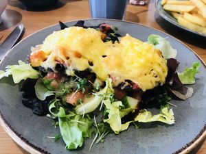 Baked mushroom with vegan cheese   at Waterside Cafe in Kendal