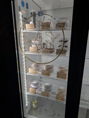 Grab and go fridge located inside of Beech Kombucha at Simply Naked Co. in St Petersburg
