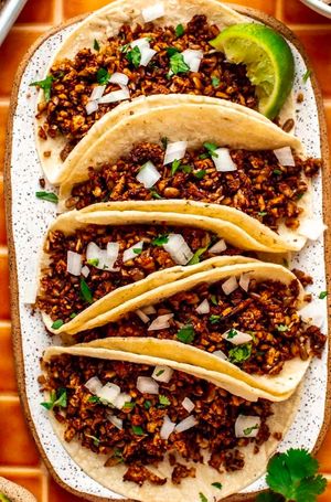 vegan street tacos 
vegan asada or chicken, onion, cilantro & lime, red or green salsa at Chiquito Picoso Kitchen in Moreno Valley