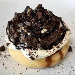 Almond Frosting, 'Oreo' Cookies, Chocolate Chips, and Chocolate Sauce! at Cinnaholic - South Euclid in South Euclid