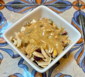 Fruit and nut mix with peanut butter at The Collective by Market Cafe in Dubai