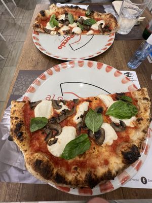 The pies are quite large (and delicious).  If you’re not too hungry, you can share a pie and they serve it like this 🙂   This was our late evening snack, so we shared a pie. at Al Solito Porzio | Pizzeria Palermo in Palermo