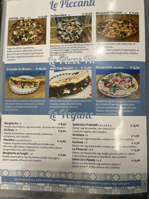 The vegan menu.  They have vegan cheese as an option, but you can also order a cheeseless pie with your favorite vegetables    at Al Solito Porzio | Pizzeria Palermo in Palermo