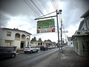 Street sign next to a church ⛪️   at Eden Vegan Cuisine in Bridgetown