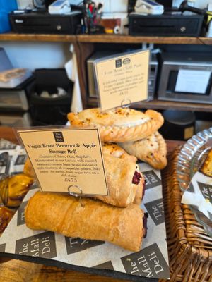 Vegan beetroot and apple sausage rolls and vegan bean chilli pasties in the back at The Mall Deli in Bristol