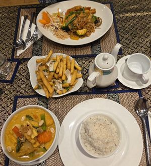 Pad Thai, salt and pepper chips, massaman curry and coconut rice. at Asaya Thai Restaurant in Keswick