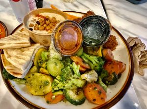 Roasted Vegetables, Hummus, Pita, Harissa, & Garlic Herb Oil at Sheesh Mediterranean in Dunwoody