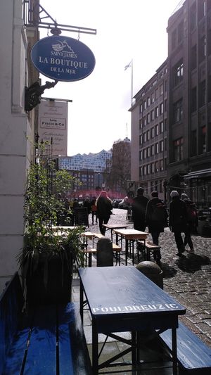 View from the seating area outside towards Elbphilharmonie at Ti Breizh in Hamburg