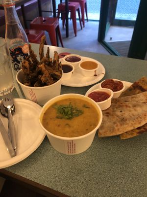 Taarka daal & rice, okra fries& 3 sauces & Paratha & Thepla. Everything delicious!   at Bundobust in Leeds