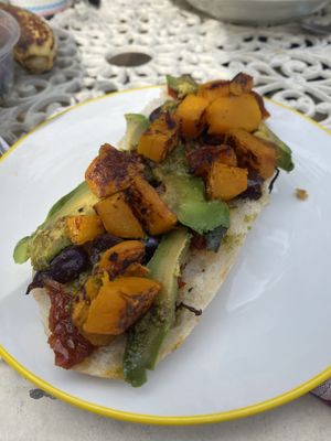 Antipasti Focaccia (made vegan by swapping out pesto for vegan pesto and cheese for avocado)  at Neville Coffee Cart in Narara