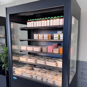 Grab & go cooler with prepared vegan meals, dips, spreads, chutneys, and vegan/gluten-free baked goods. at Hummingbird Nutritious Eats in Andover