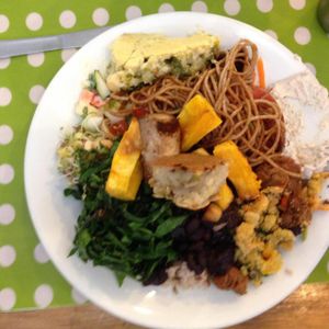 The dish of my omnivore boyfriend: feijoada, whole pasta, braised cabbage, fried yucca, sprouted grains, mayo salad, alfalfa sprouts, glam, vegetable pie.
 at Vegg's Restaurante in Sao Paulo